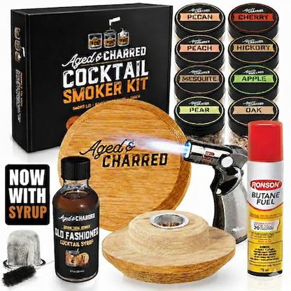 Aged & Charred cocktail smoker kit includes Smoke Lid made from 100% oak, 8 wood chips flavors, a culinary torch, butane and our Aged & Charred Signature Syrup all packaged in a handsome gift box