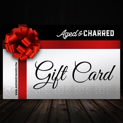 A digital gift card from Aged & Charred with a red ribbon 